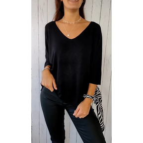 Blusa confortável de mangas longas com decote em V