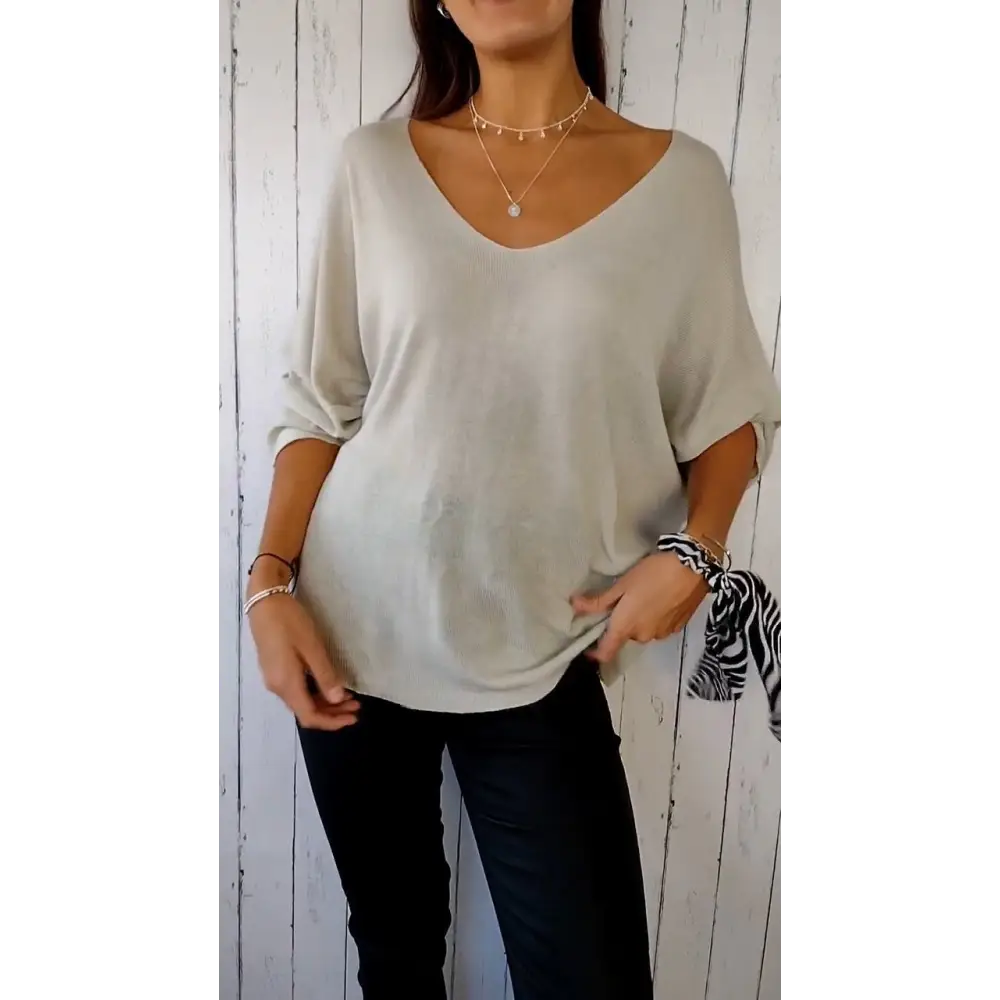 Blusa confortável de mangas longas com decote em V