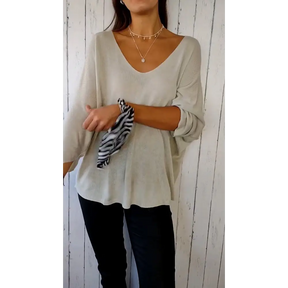 Blusa confortável de mangas longas com decote em V