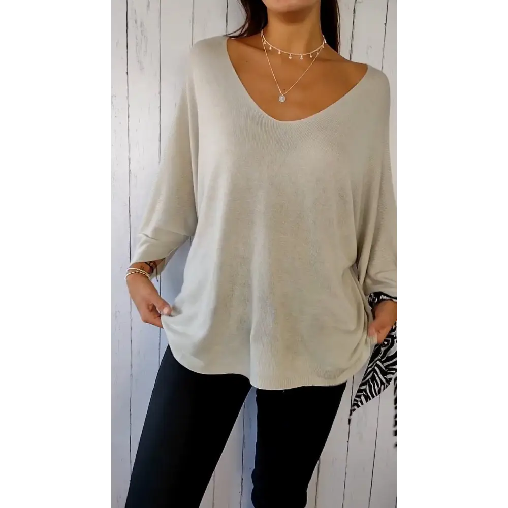Blusa confortável de mangas longas com decote em V